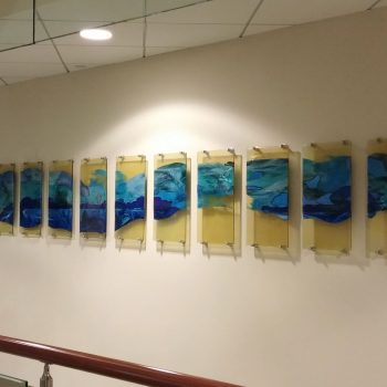 14 - 12”X 30” panels<br>
Fused glass<br>
Liberty Mutual, Floor 2,
Dover, NH<br>
Part of a commissioned series highlighting<br>the New Hampshire ecosystems<br>
Artists: Caroline Parent, Dr. Kathleen Kimball