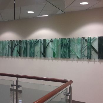 16 - 12”X 30” panels<br>
Fused glass<br>
Liberty Mutual, Floor 3, Dover, NH<br>Part of a commissioned series highlighting <br>the New Hampshire ecosystems<br>
Artists: Caroline Parent,
Dr. Kathleen Kimball