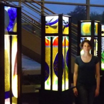 Luminary Totems<br>
18” square by 88” in height<br>
Fused glass, LED, custom
wood pedestal<br>
Artist: Caroline Parent