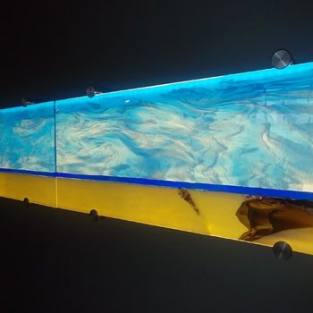 12” x 118”<br>
Fused glass and LED luminary<br>
Artist: Caroline Parent