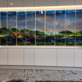 9 panels, 136" x 60"<br>
Fused glass, painted birch panels<br>
Dartmouth Hitchcock Medical Center, Lebanon, NH<br>
Artist: Caroline Parent